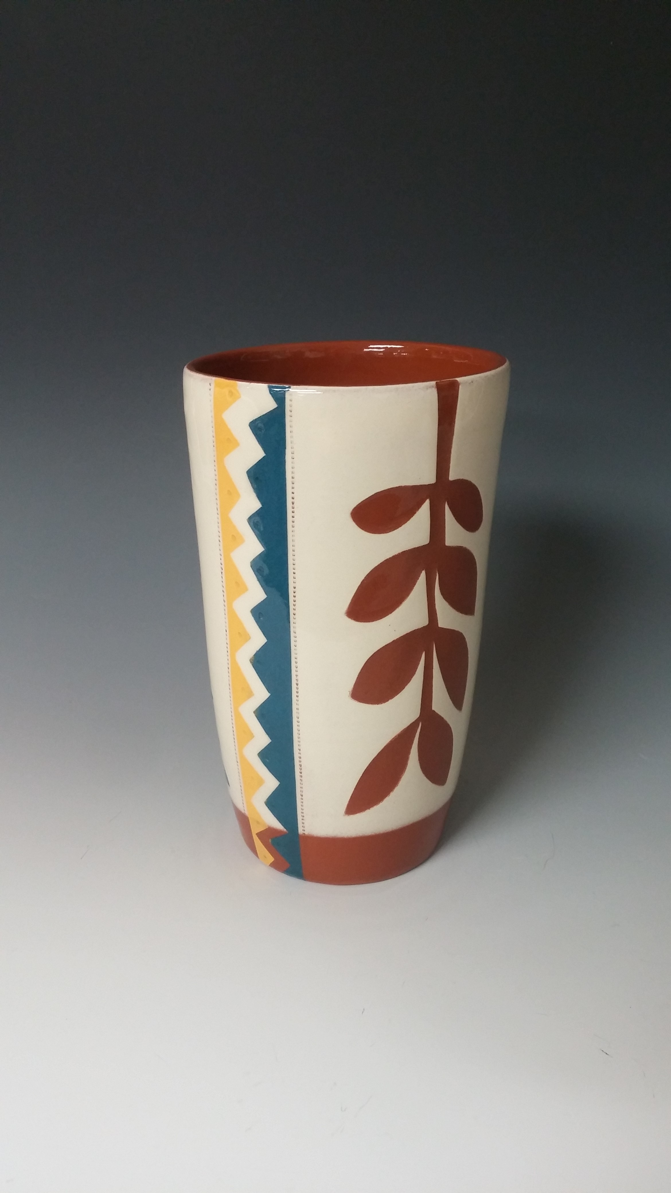 Cheerful Pint Sized Tumbler With Leafy Cutout and Zigzags