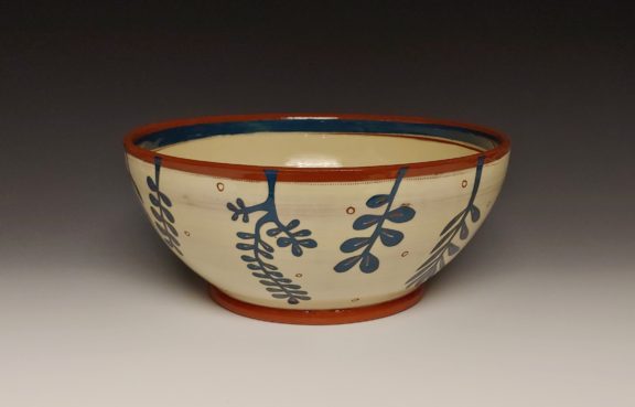Large Serving Bowl With Dark Blue Leafy Cutouts Interior Band and Dots