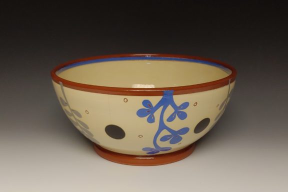Medium Serving Bowl with Blue and Gray Leafy Cutouts Interiour Blue Band and Black Spots